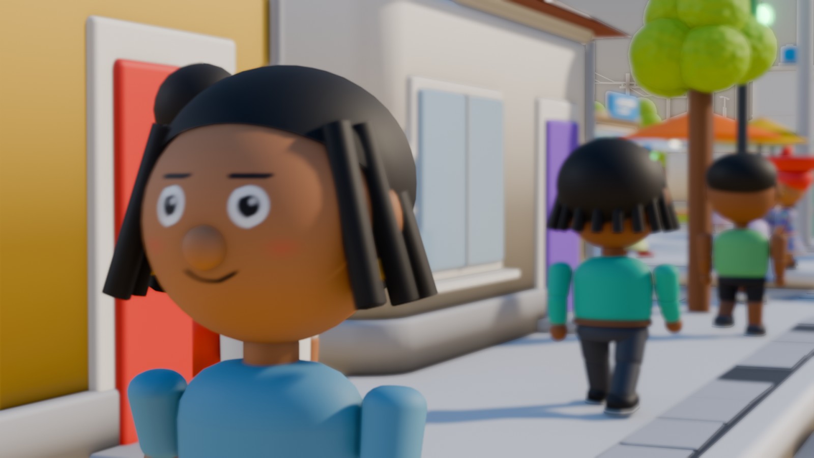 Tola, smiling, in a blue top